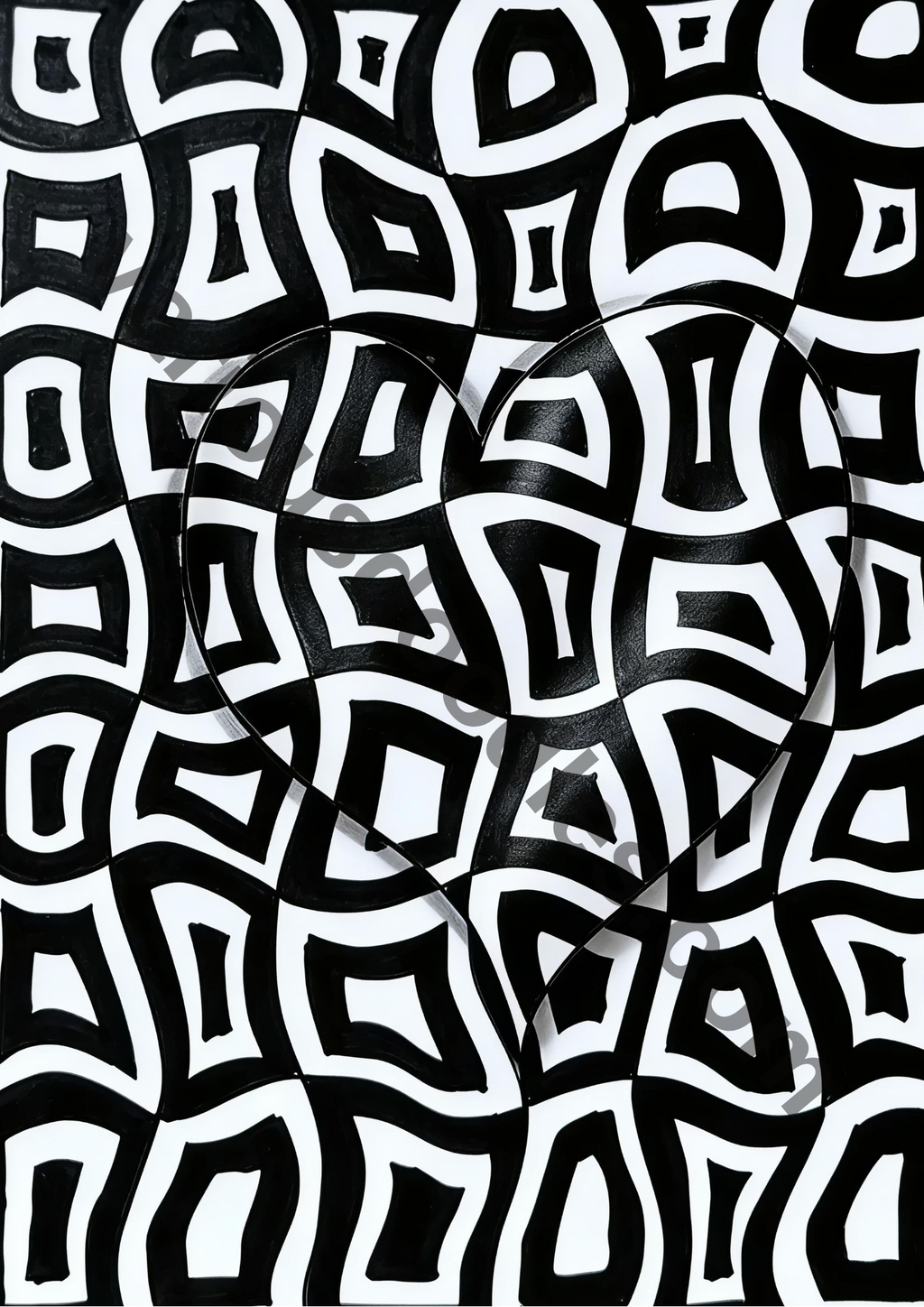 Black and white geometric abstract art print in silver frame displayed in luxury beige salon interior